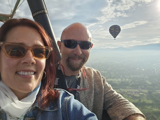 DebraandDrColladaonahotairballoonridethroughtheclouds