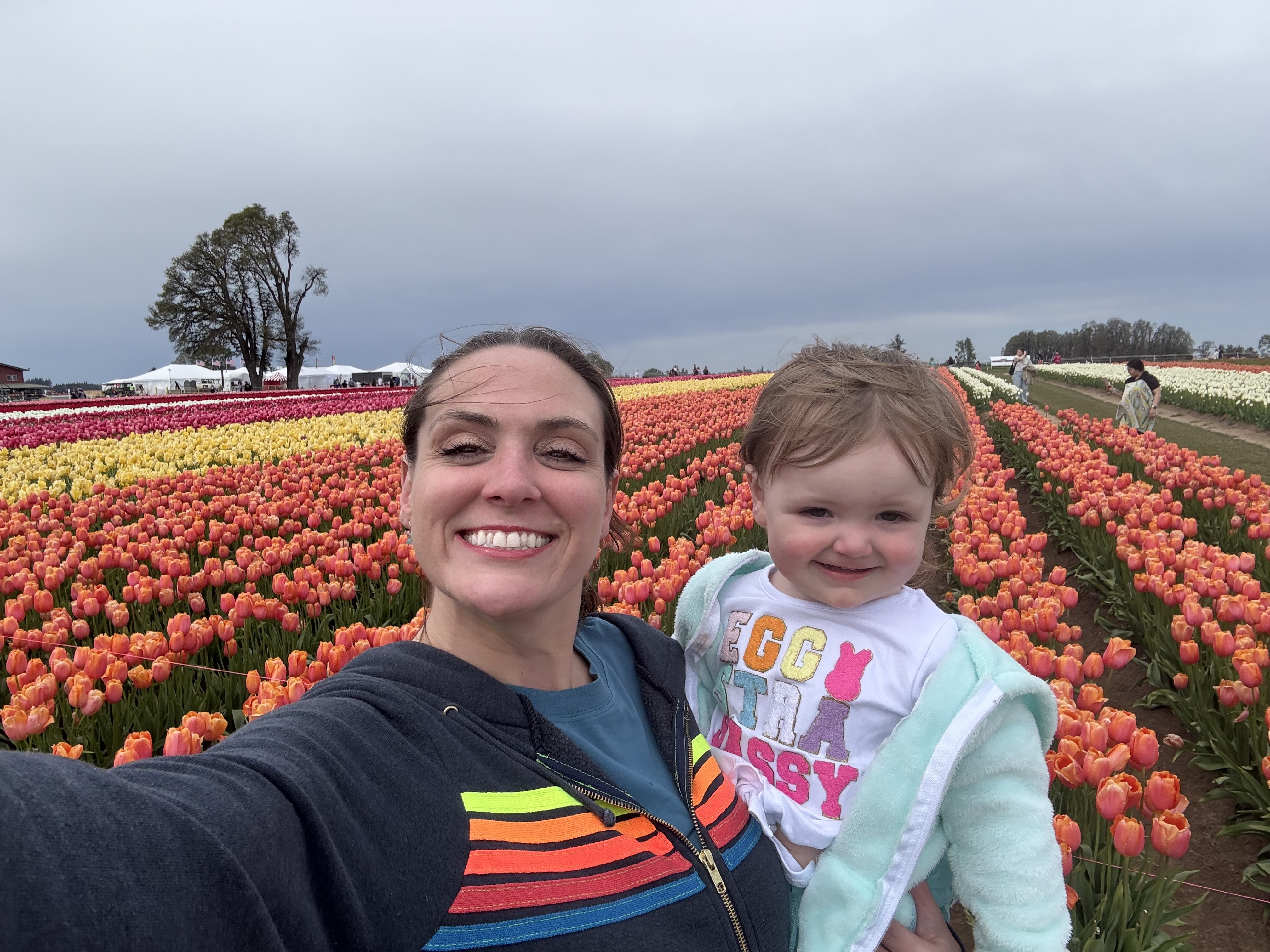 DrMeierposesinatulipfieldwithhertoddler