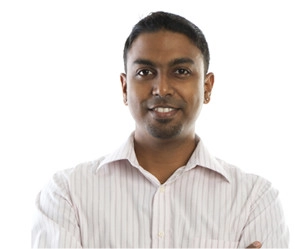 Amanposingforapictureagainstawhitebackground