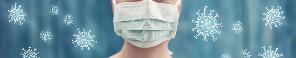 Illustrationofahealthcareworkerinasurgicalmasksurroundedbyhand-drawnvirusparticles