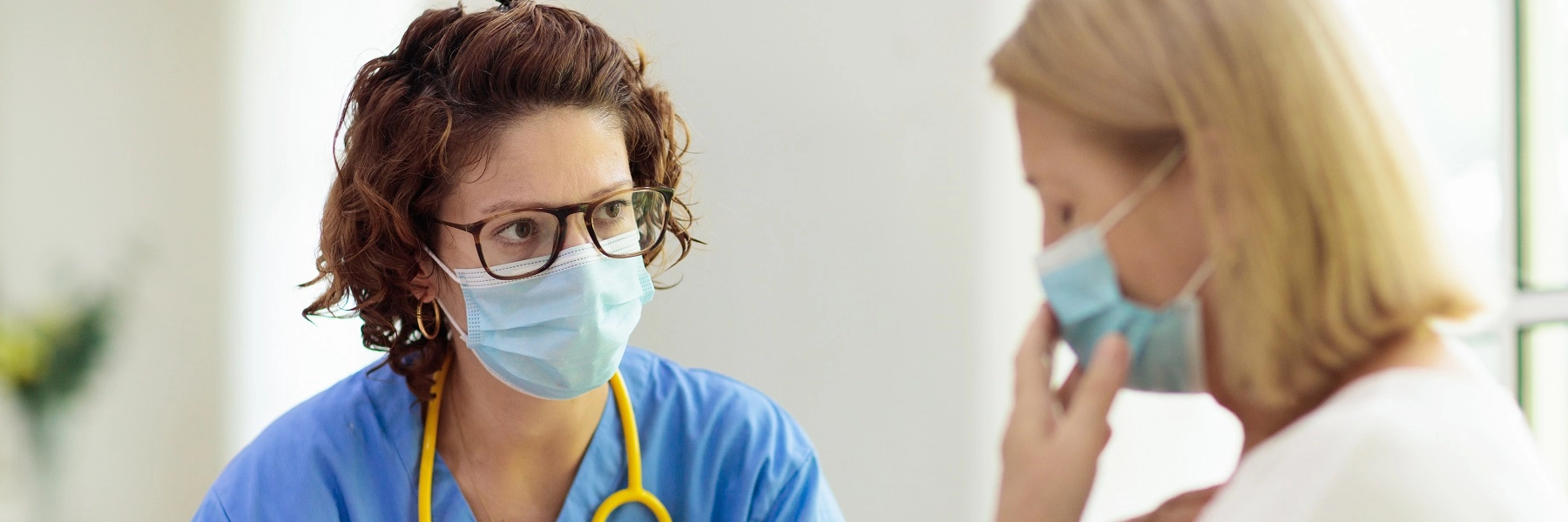 Painclinicnurselisteningtoapatient