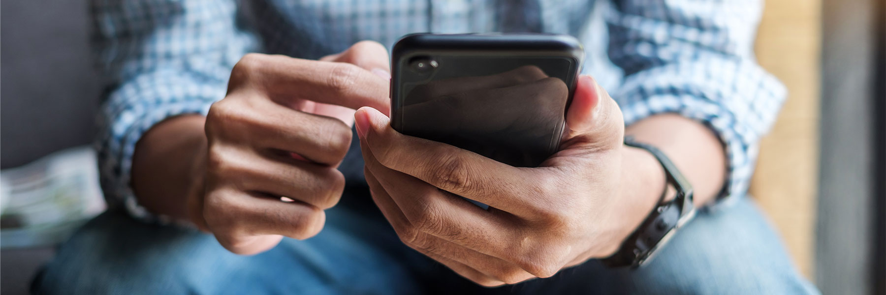 Manreviewinghismedicalrecordonaphone