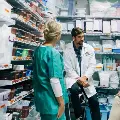 Stockphotoofnurseandpharmacistsinahospitalpharmacystockroom