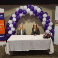 Cheryl Wolfe, CEO at Salem Health, and Maggie Hudson, CEO of Santiam Hospital, at agreement signing event
