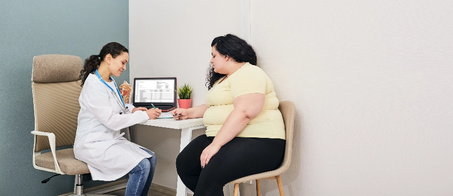 Plus size woman meeting with her doctor
