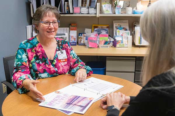 Patient meeting with a cancer nurse navigator