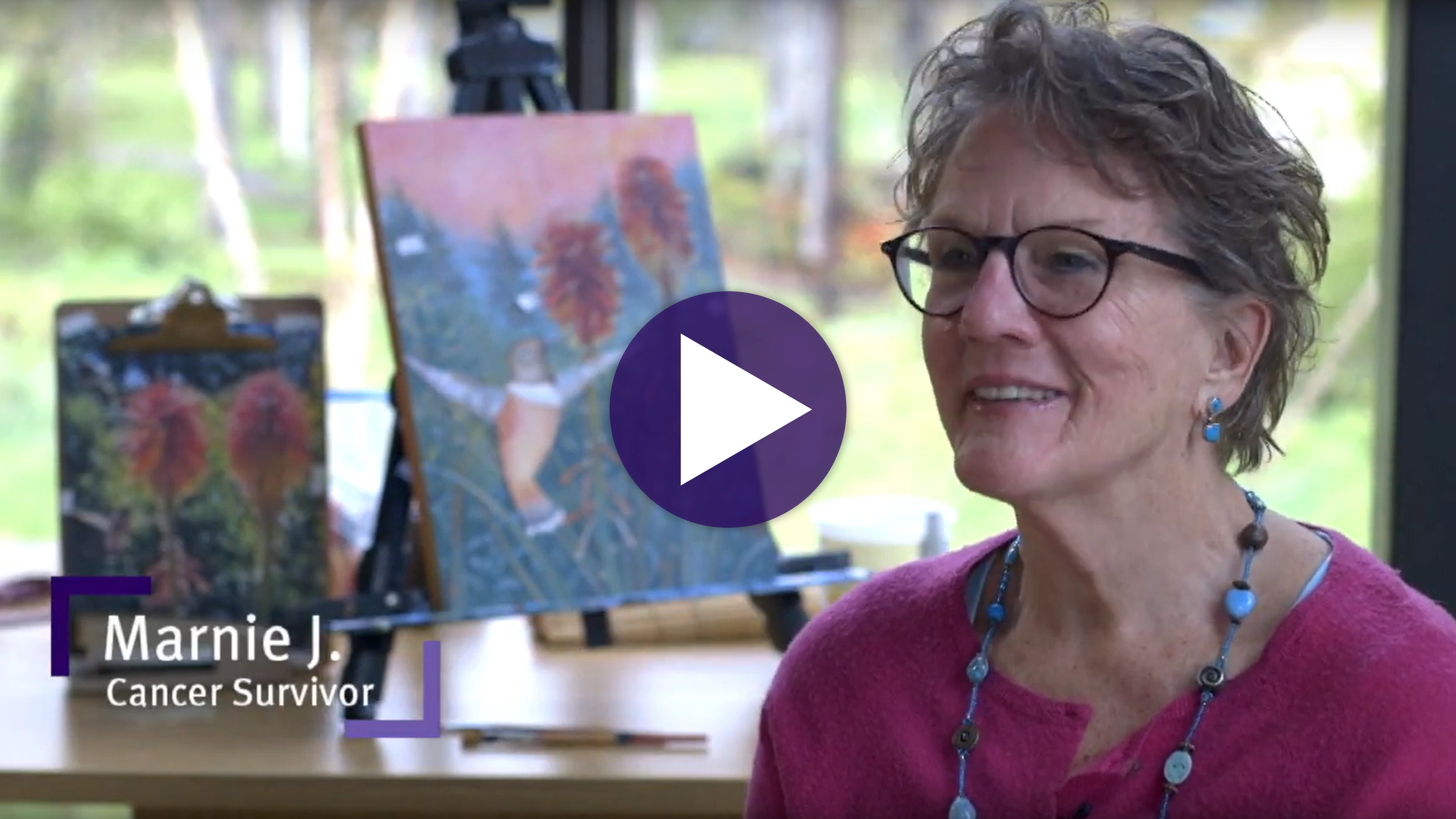 Woman sitting in the Cancer Center talking about her cancer suvival story.