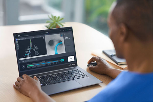 Physician reviews biopsy