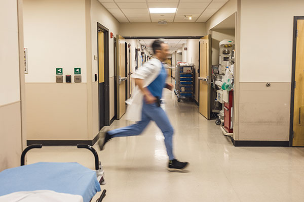 Physicianrunningtoapatient