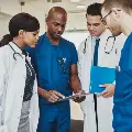 medicalstafflookingatchart