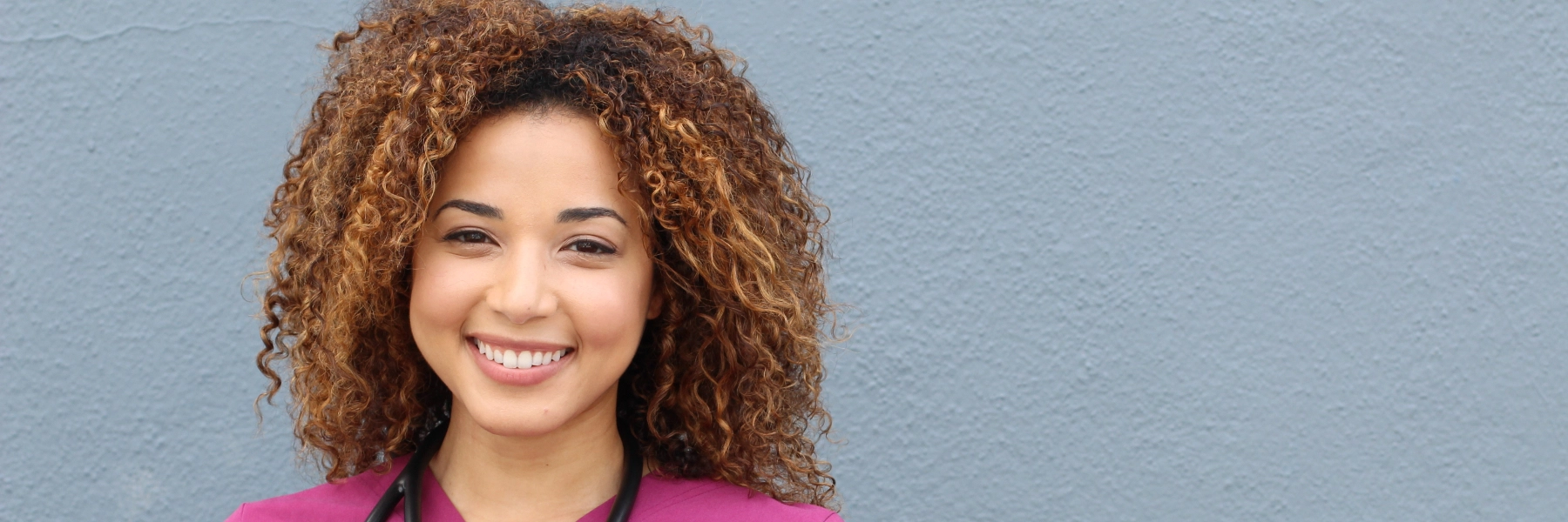 Nursestandingoutsidesmiling