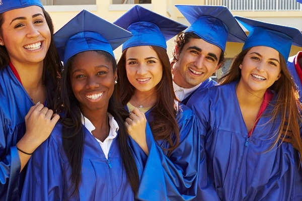 Fivenewgradsincapsandgowns