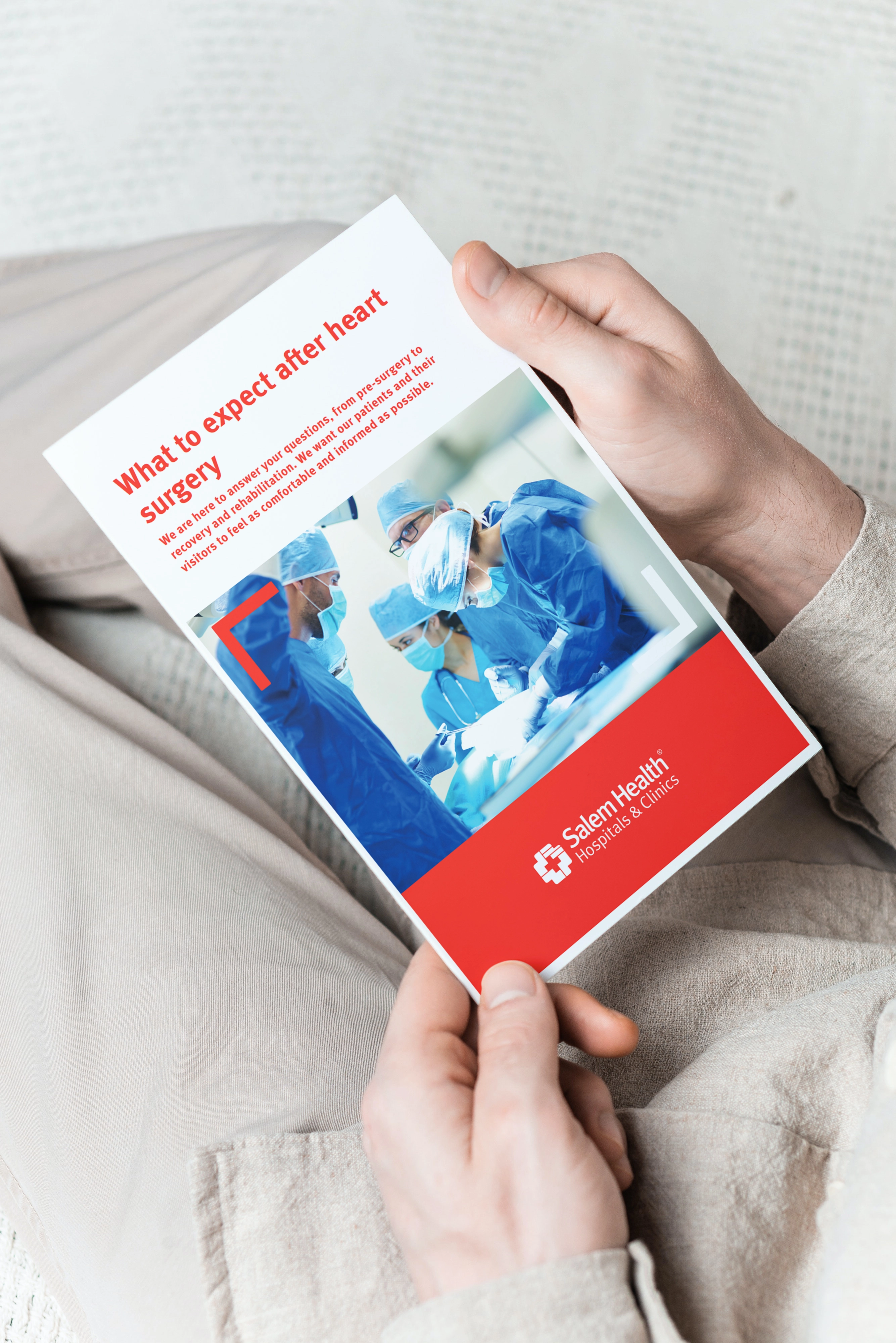 Man holding a brochure title 