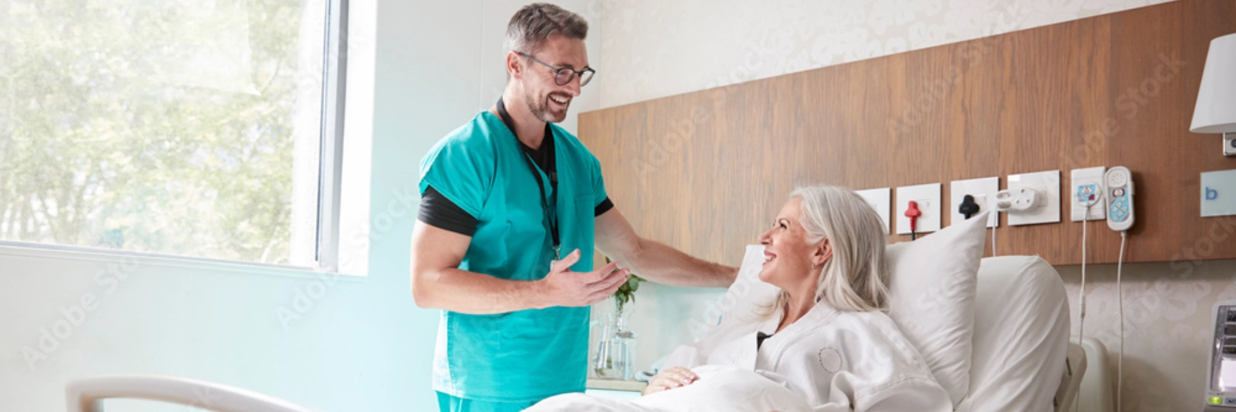 providertalkingwithpatientinbed