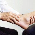 Orthopedicspecialistexamininganankle