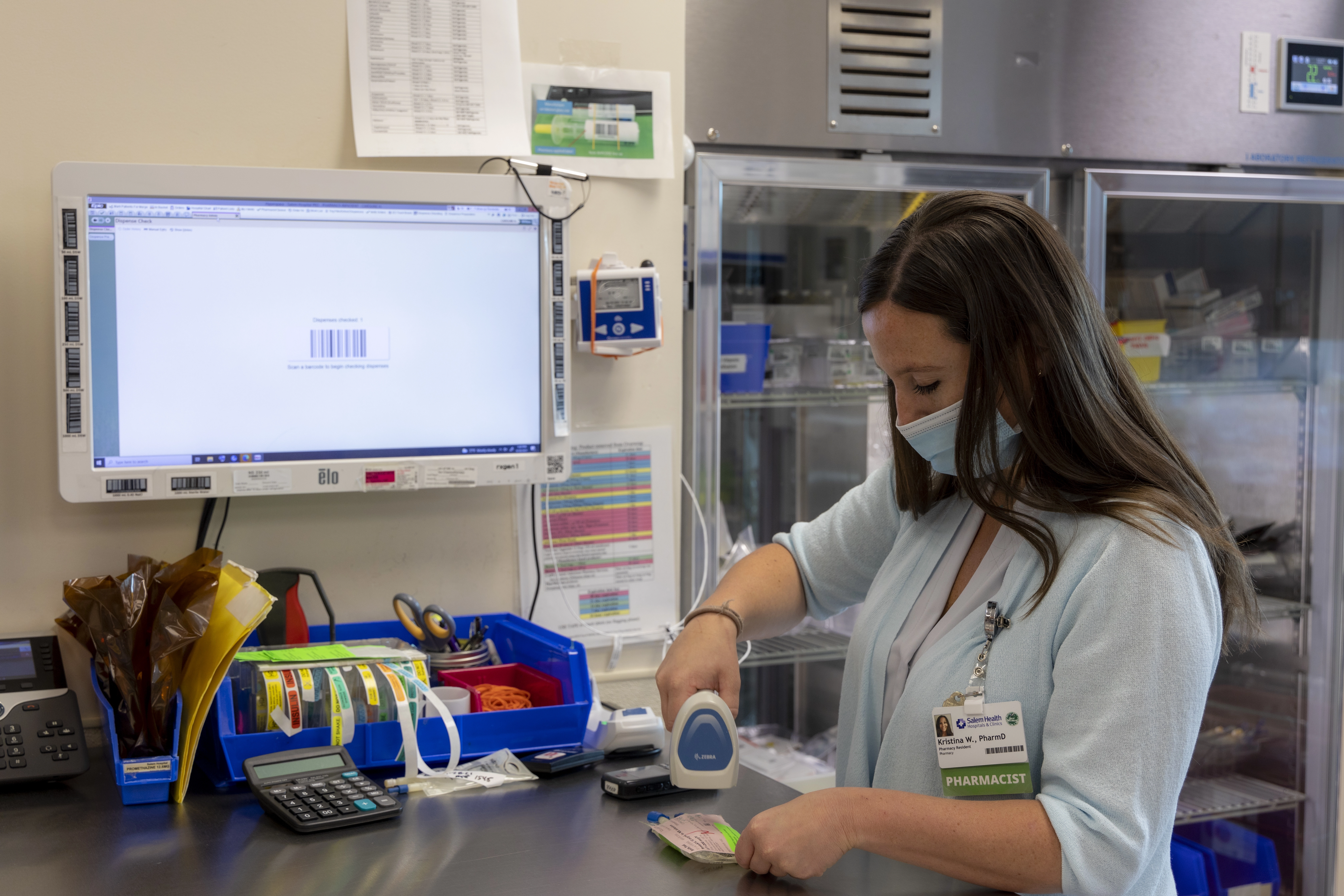 Pharmacy resident scans a medication's barcode at Salem Hospital in Salem, Oregon.