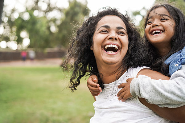 Woman playing with her child