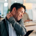 Manexperiencingneckpain