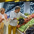 Oldercoupleshoppingforproduce