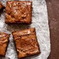potbrowniesinwaxpaperonacountertop