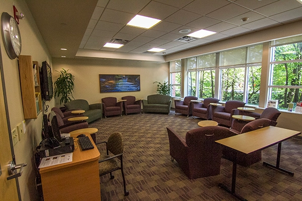 ChairsandcouchesintheCHECsupportgrouproominBuildingD