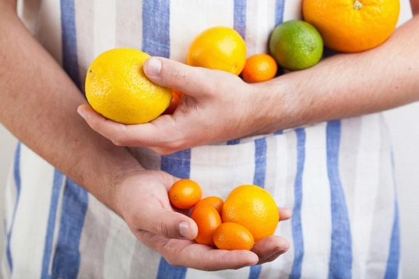 hands with fruit