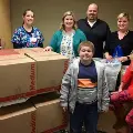 OnApril7AshleyandJeffLdroppedofftwocartloadsofboxesfilledwithmorethan600carepacksfortheSalemHealthneonatalintensivecareunitNICUandpediatrics