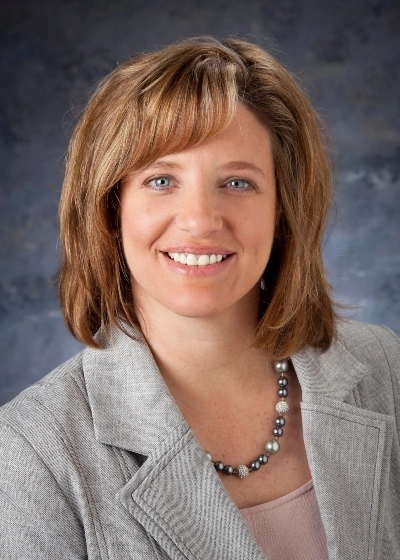 Head shot of Leah Mitchell, RN, Salem Health executive vice president of operations and chief integration officer